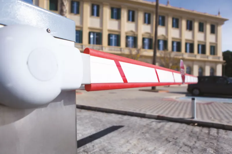 Vehicle access control with building in background